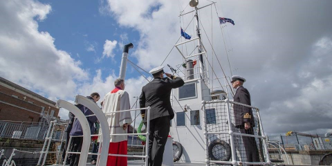 An image of the service onboard HMS M.33 from last year's Anzac Day